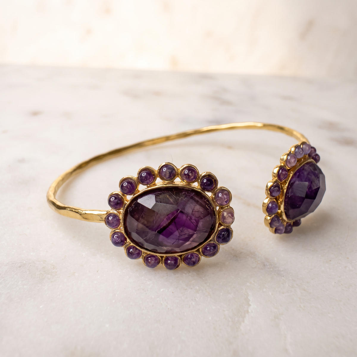 thin bracelet set with purple gemstones