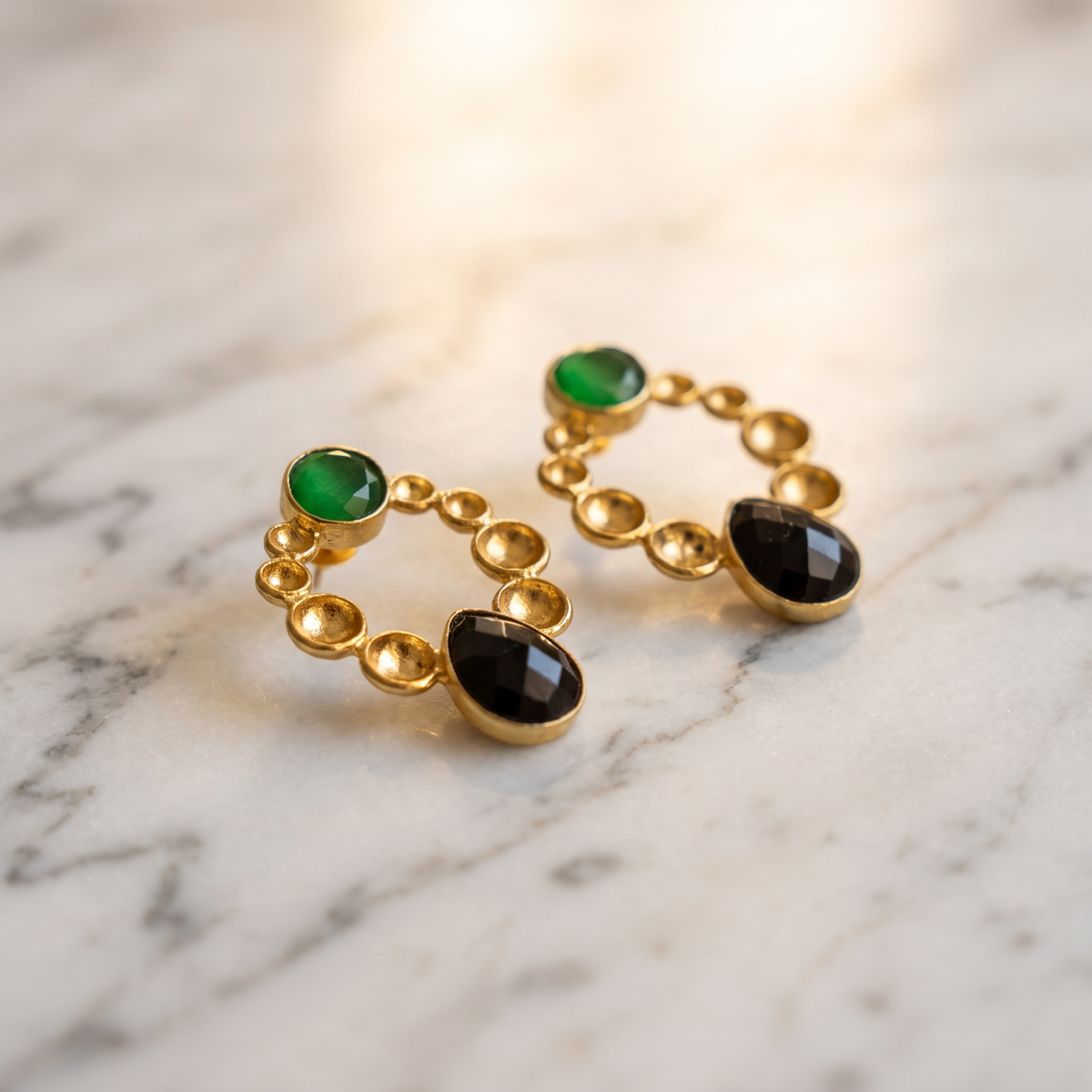circle shaped earrings contrast gemstones