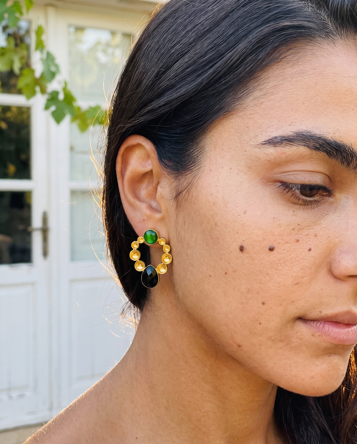 circle shaped earrings contrast gemstones
