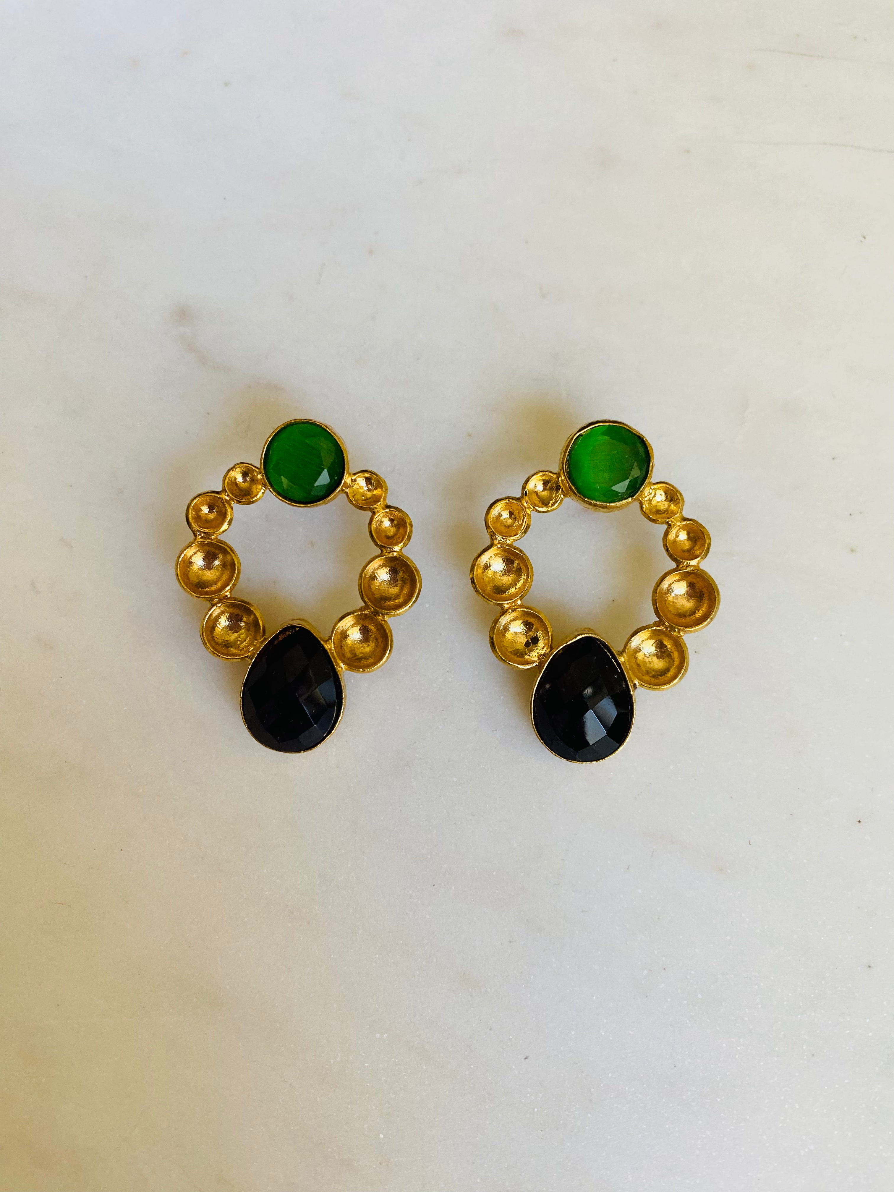 circle shaped earrings contrast gemstones