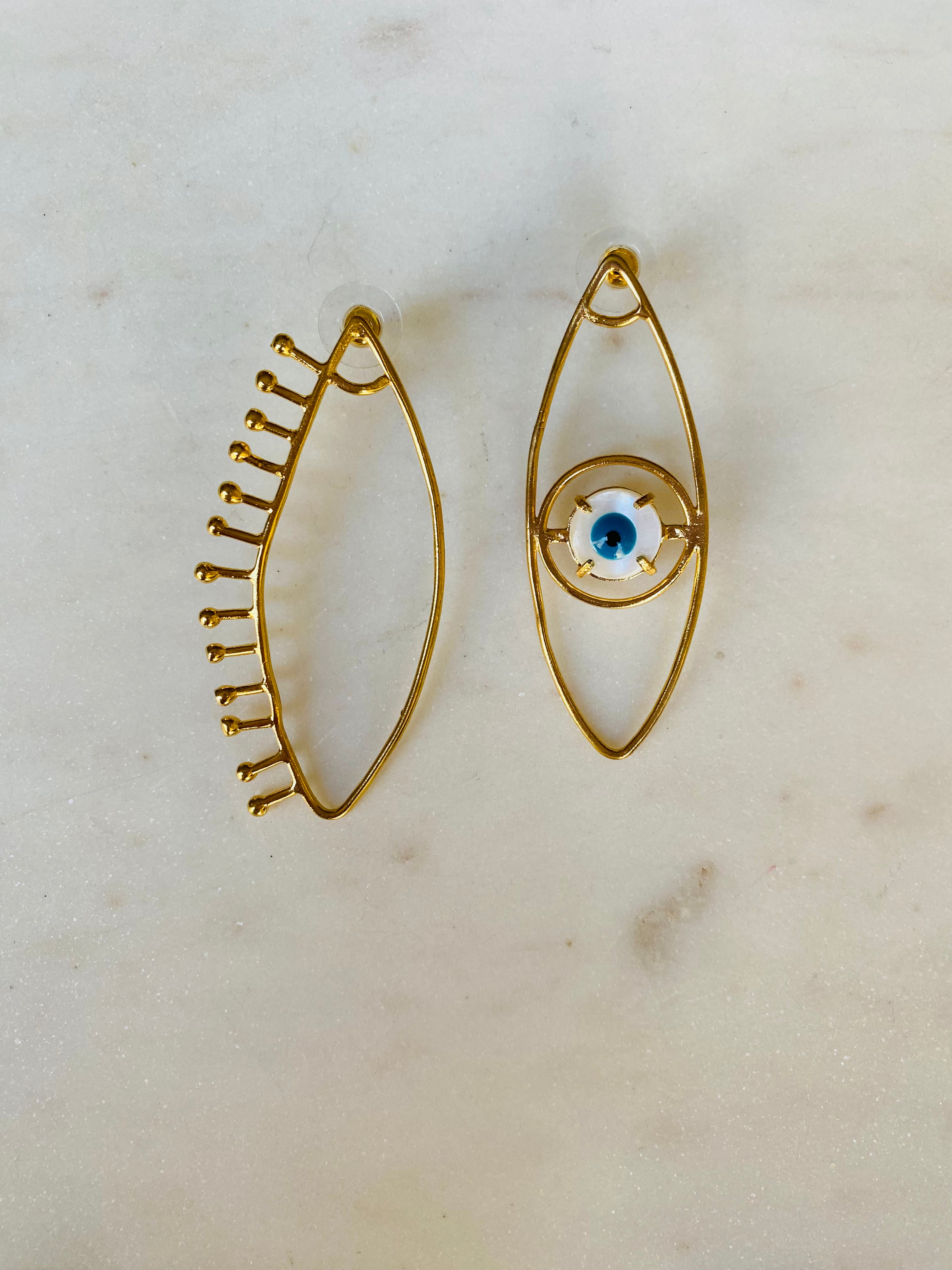evil eye assymetrical earrings