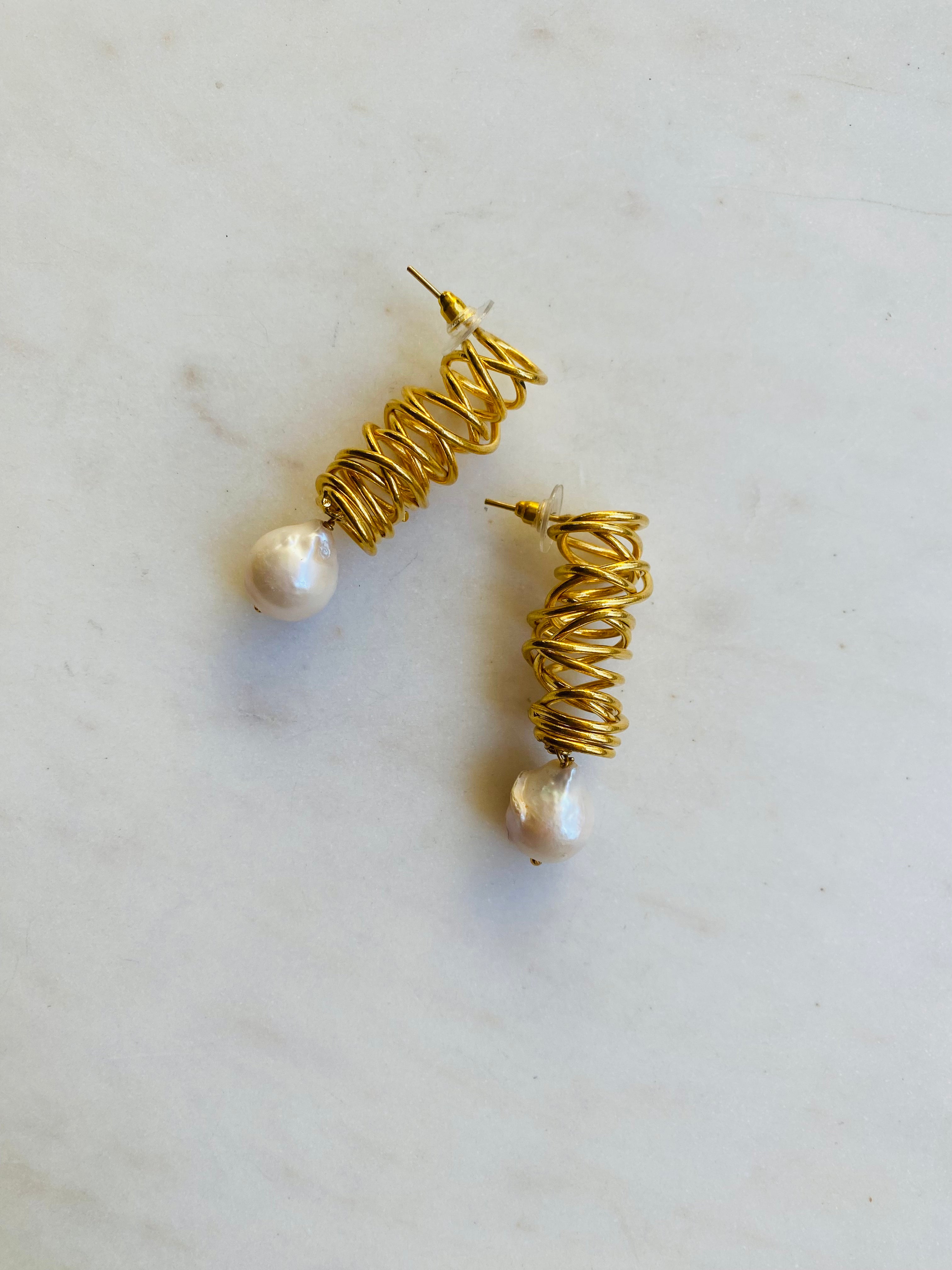 golden whirlwind pearl drop earrings