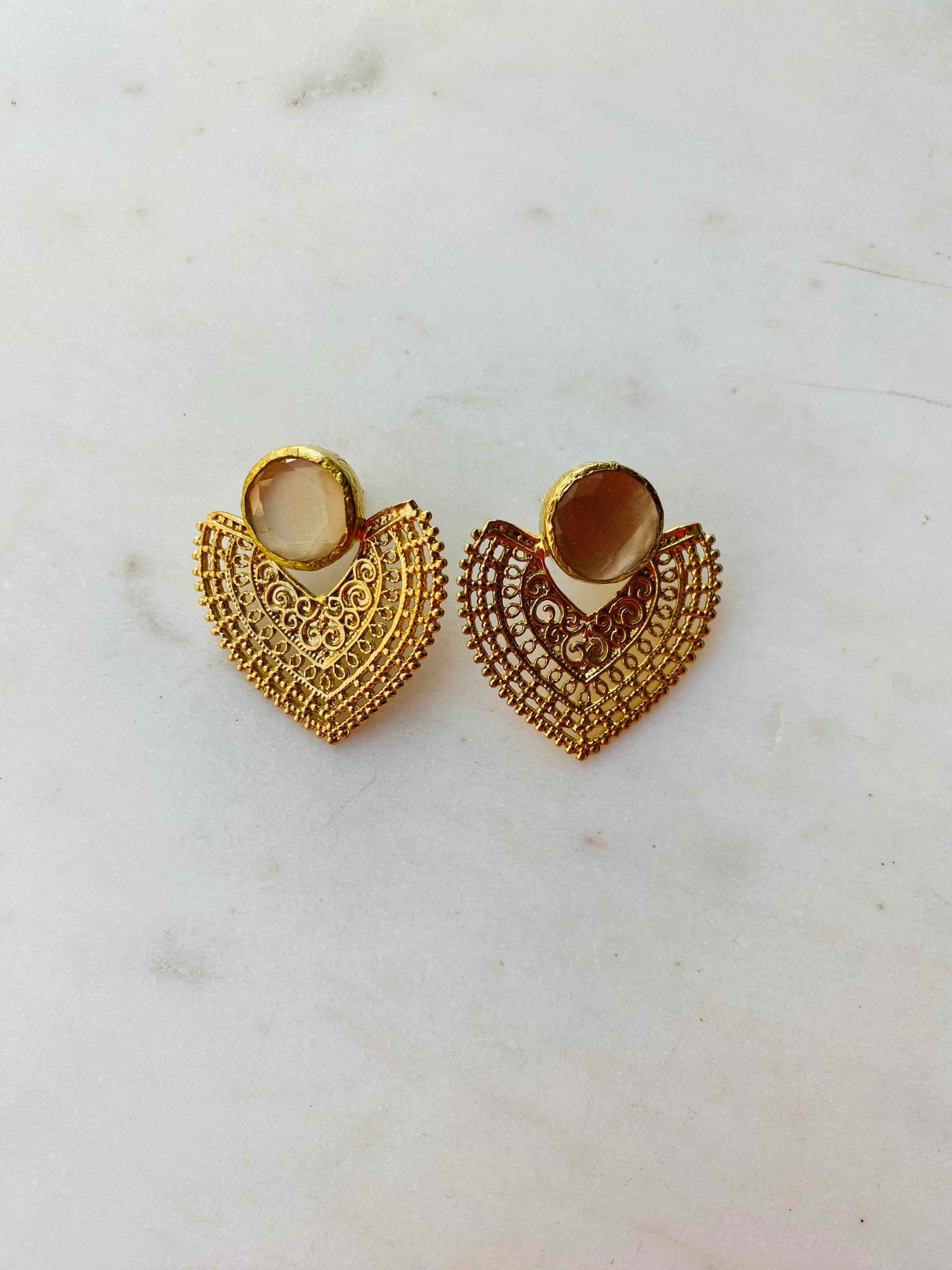 heart shaped gold design stud earrings