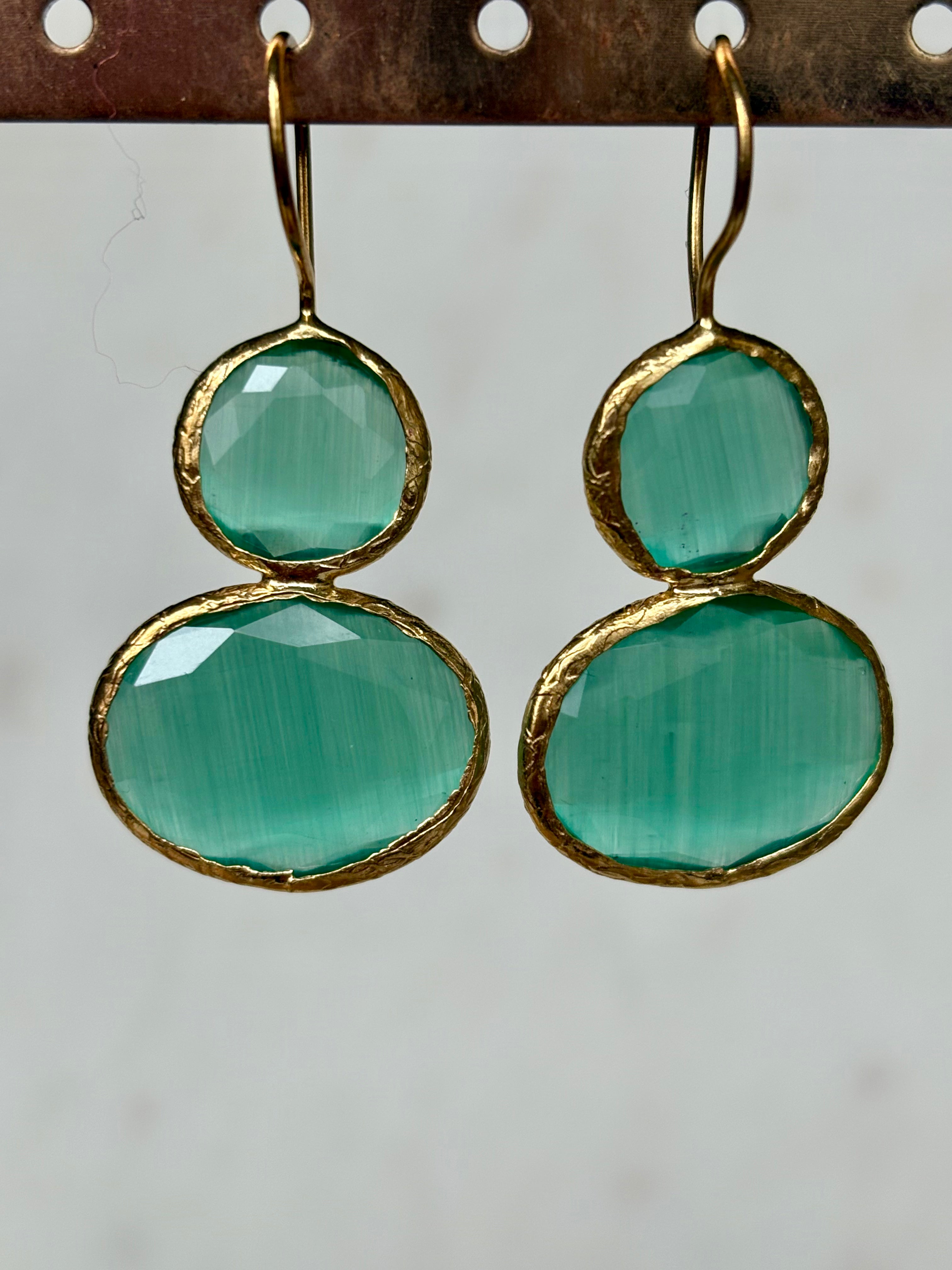 Green gemstone drop earrings