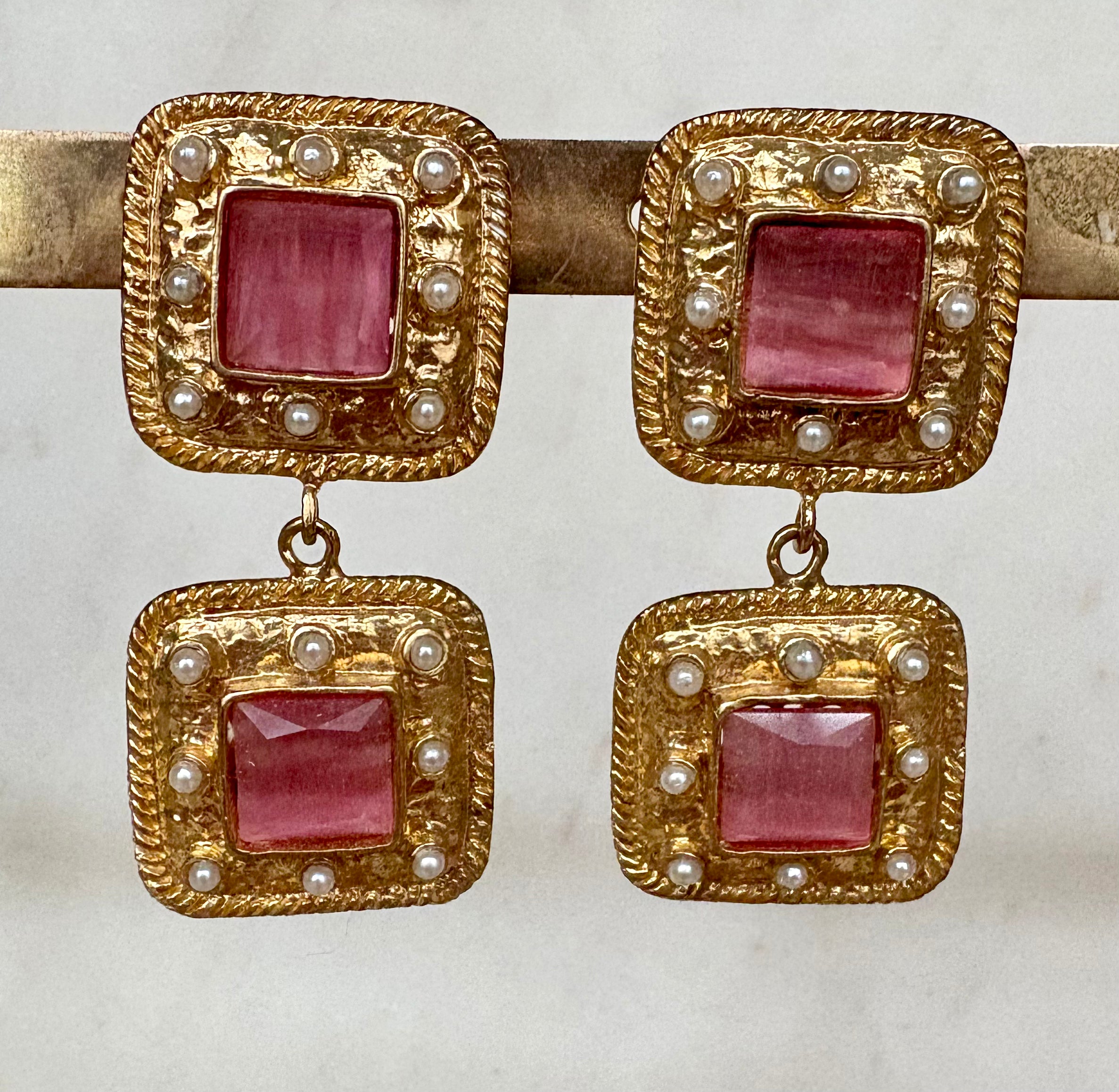 gold statement earrings with square pink gemstones