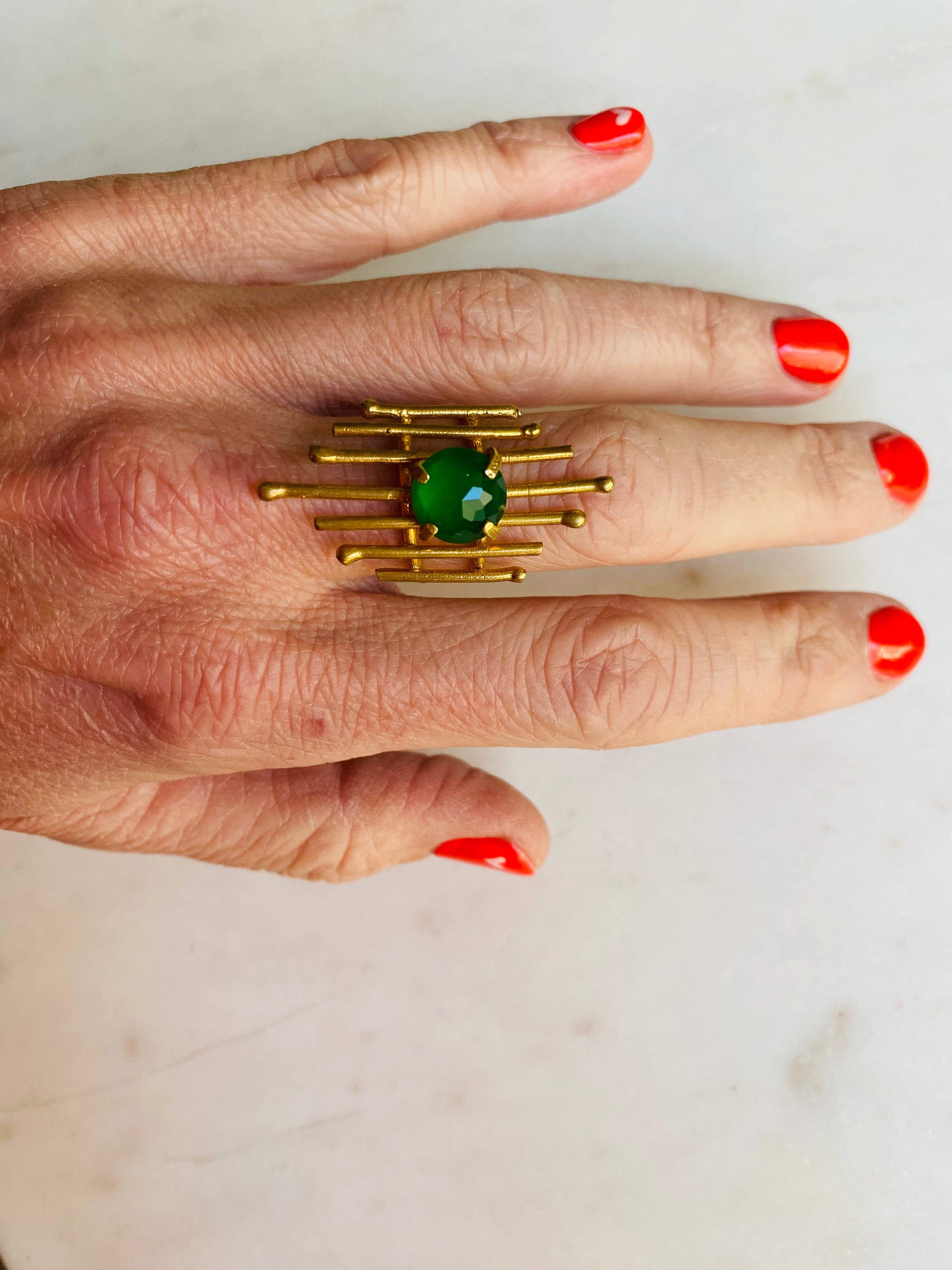 green & goldwired ring