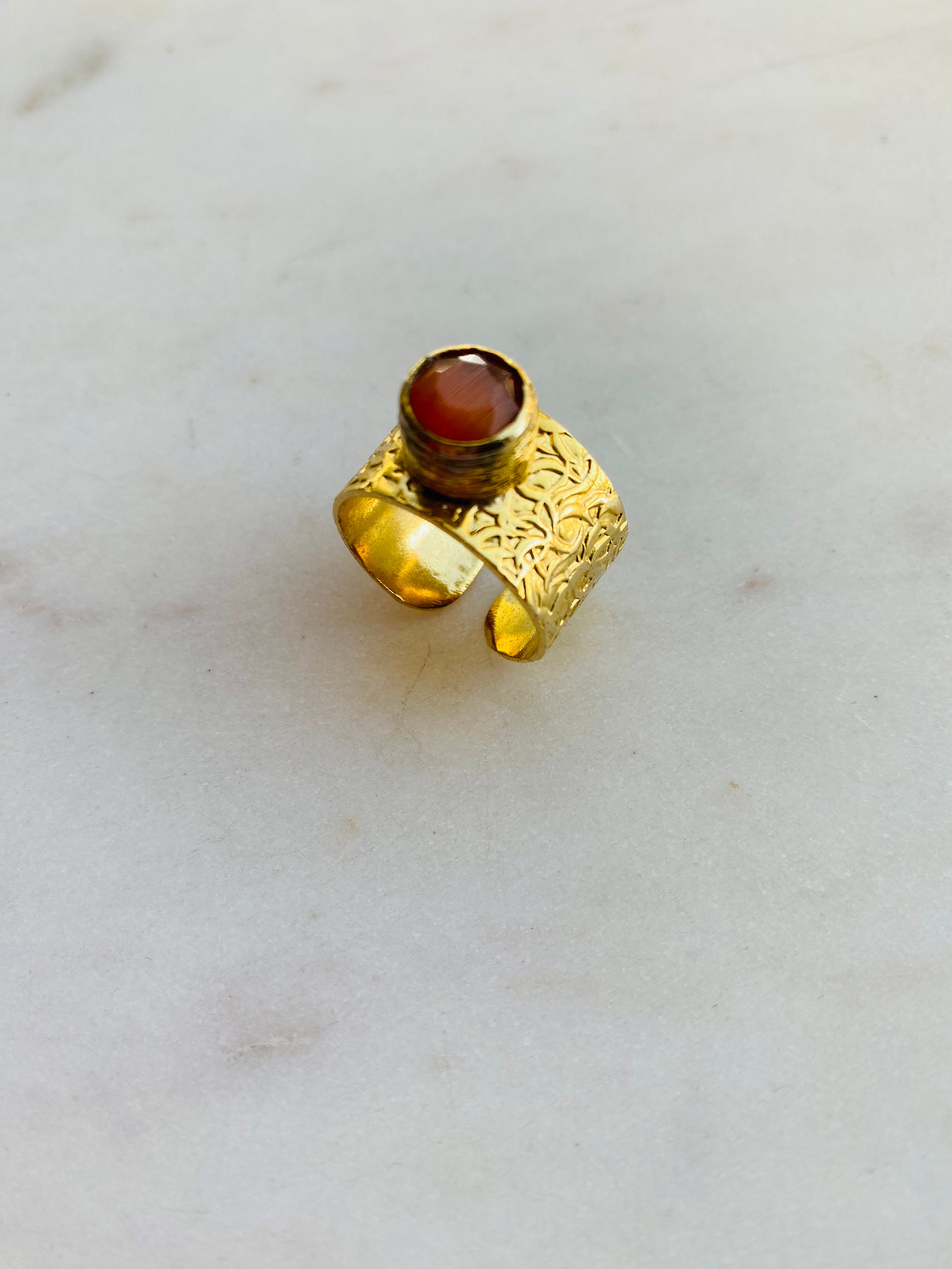 orange gemstone gold band ring