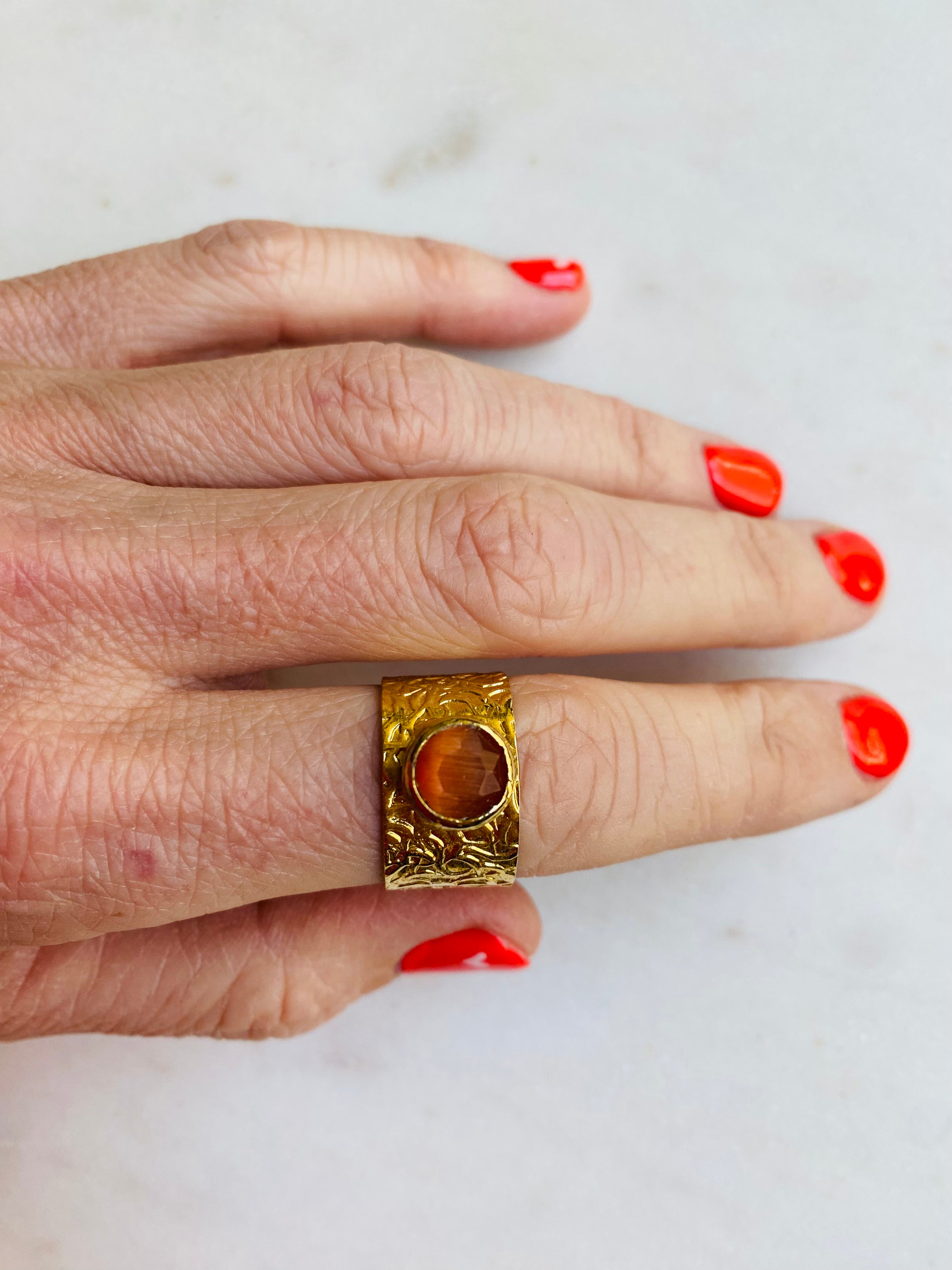 orange gemstone gold band ring