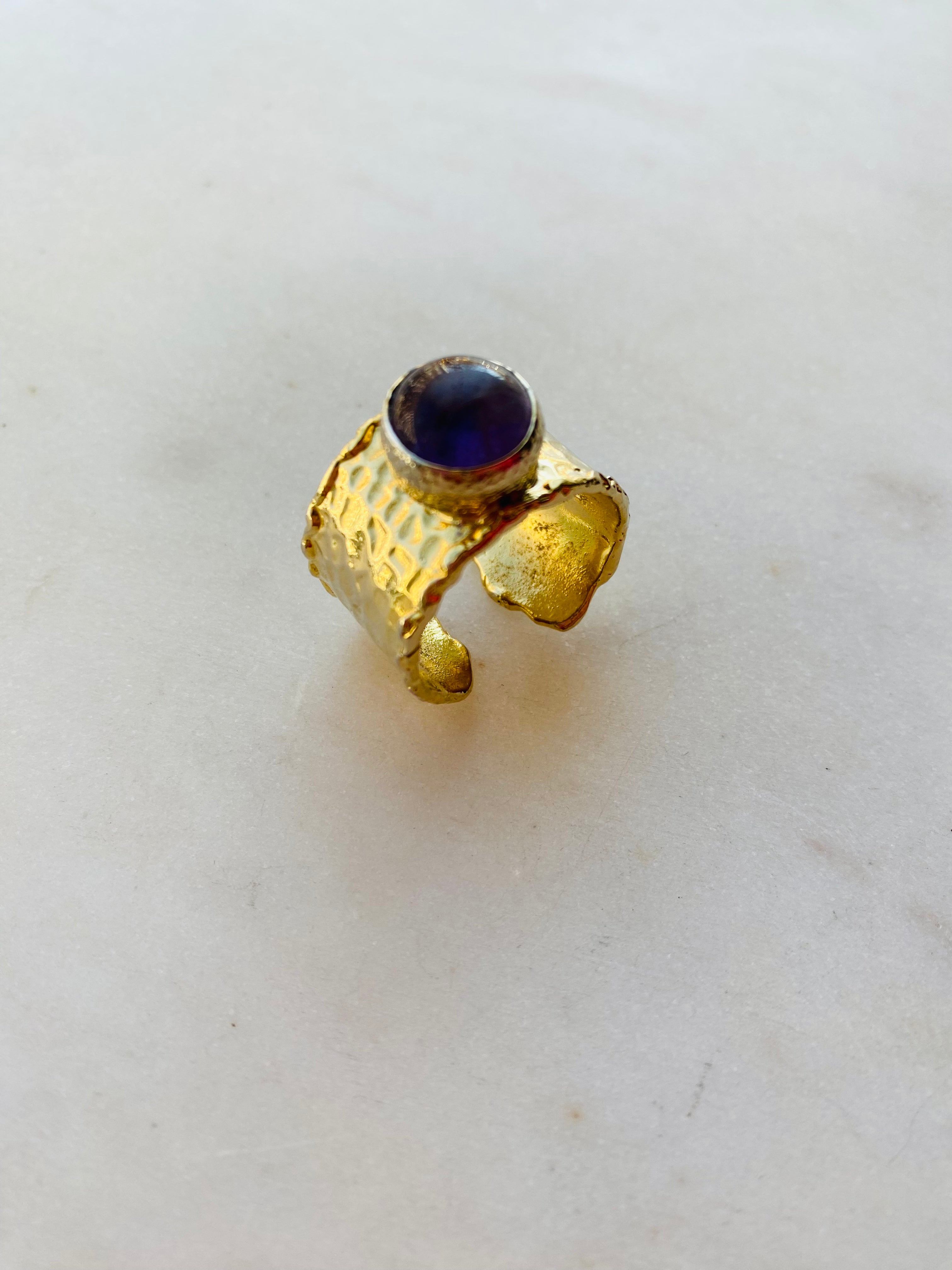 purple stone gold band ring