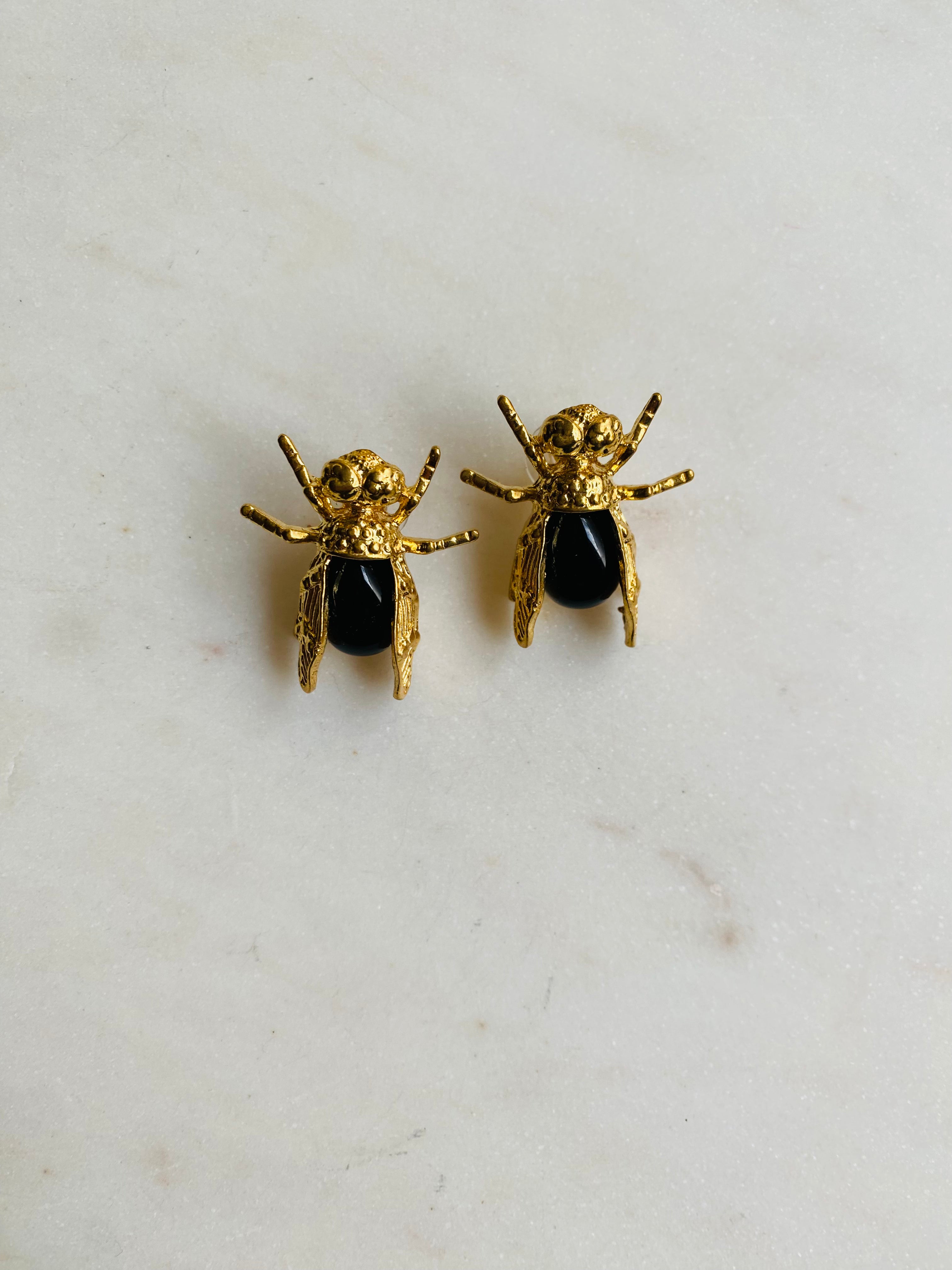 insect black gemstone earrings