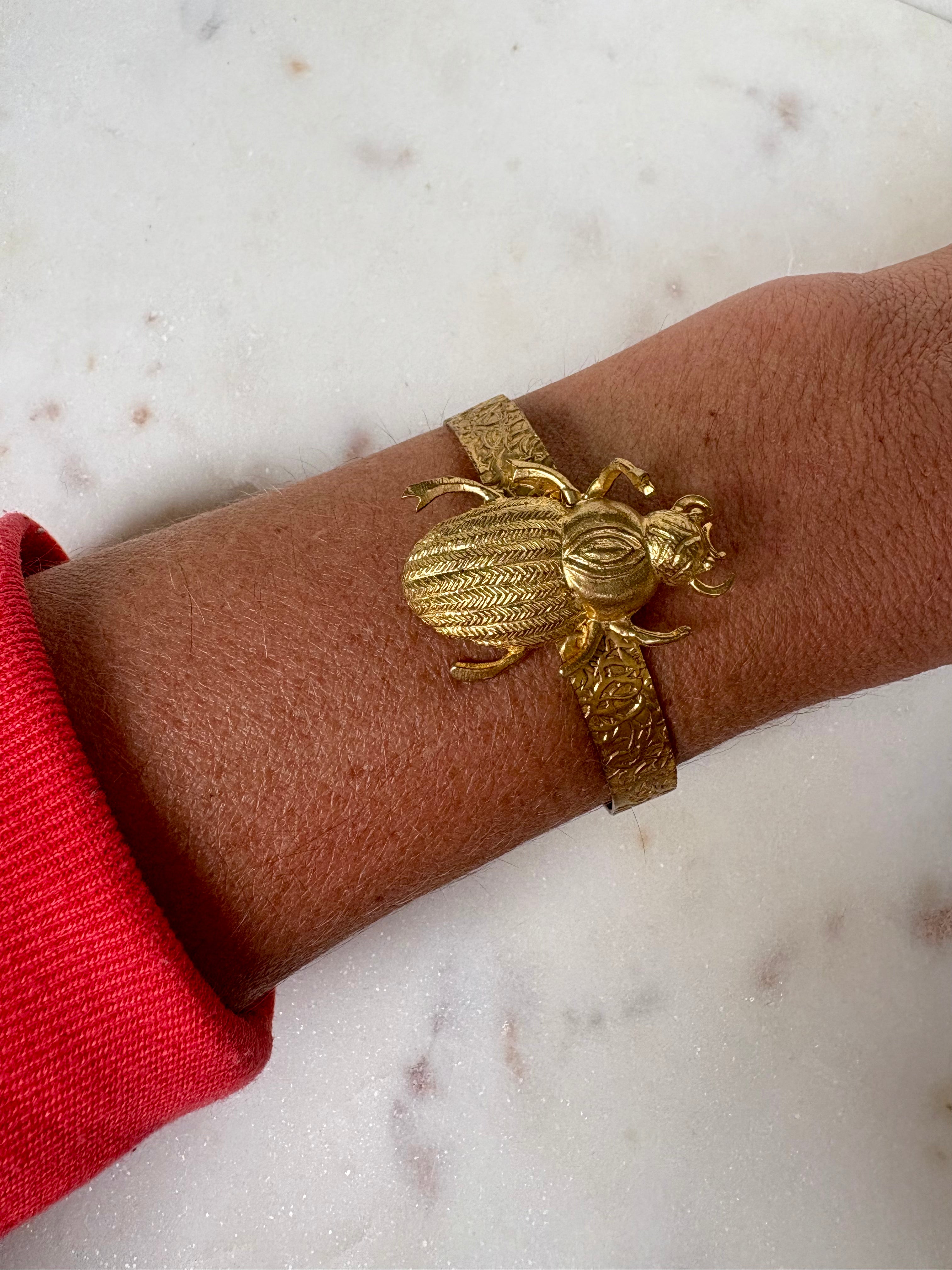 Scarab charm gold bracelet