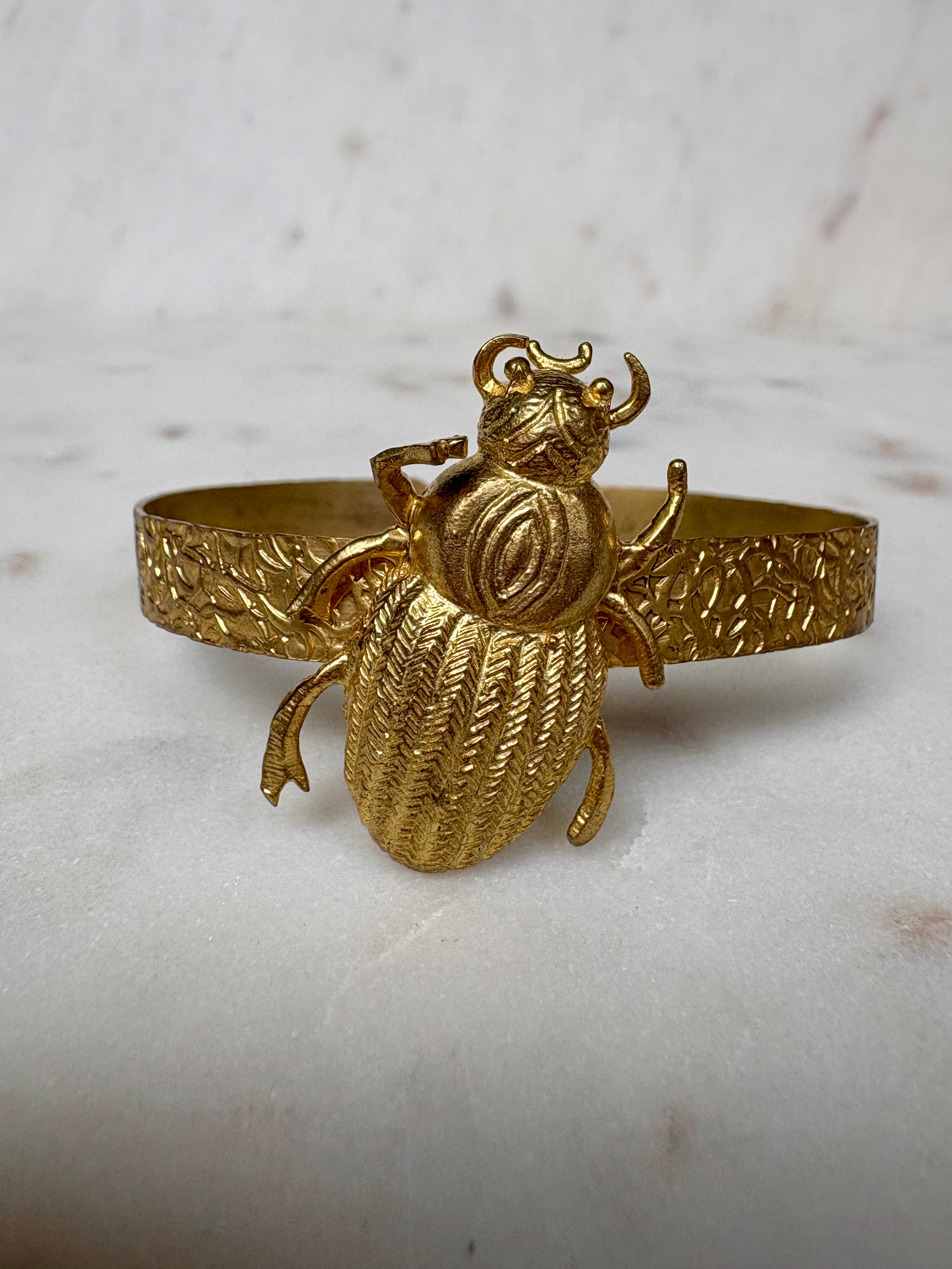 Scarab charm gold bracelet