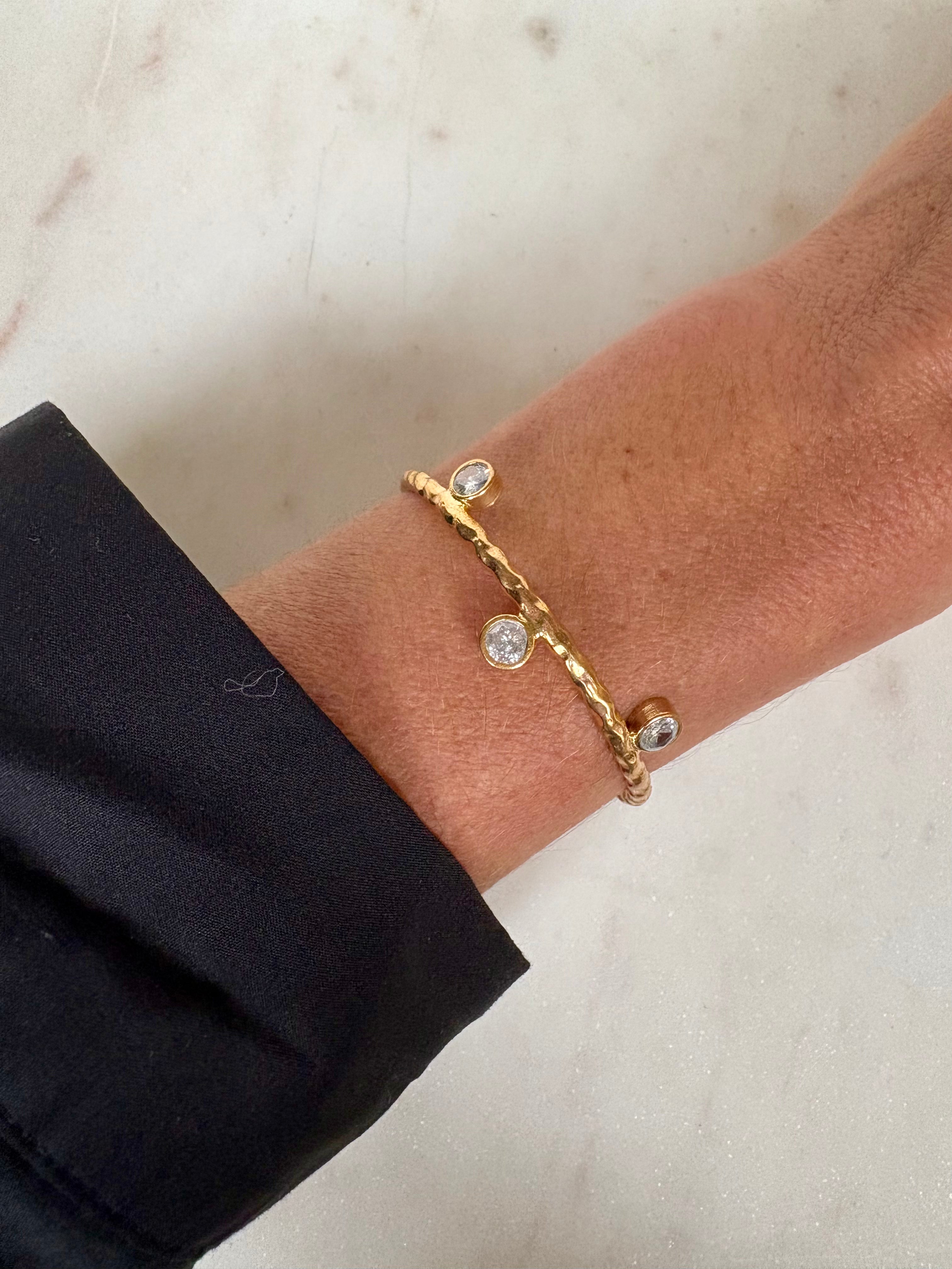 Twisted Open Bangle in Gold Zircon Detail
