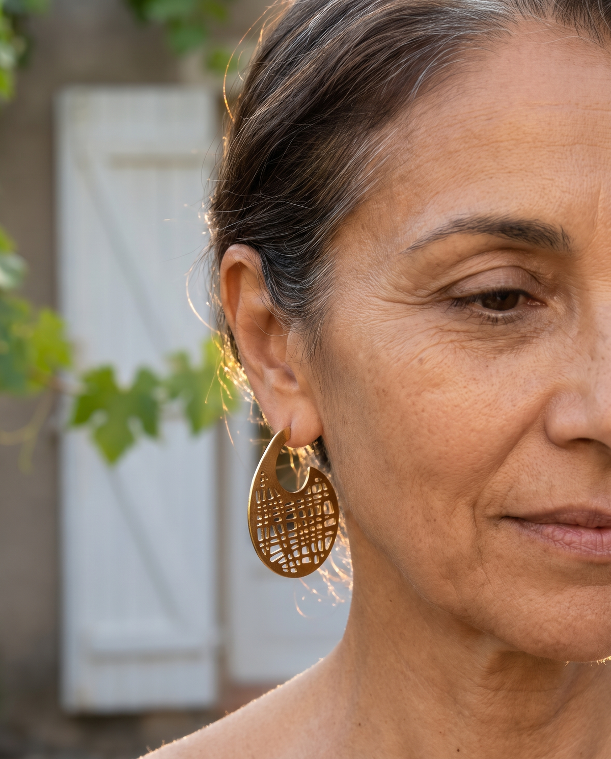 gold sculptural drop earrings