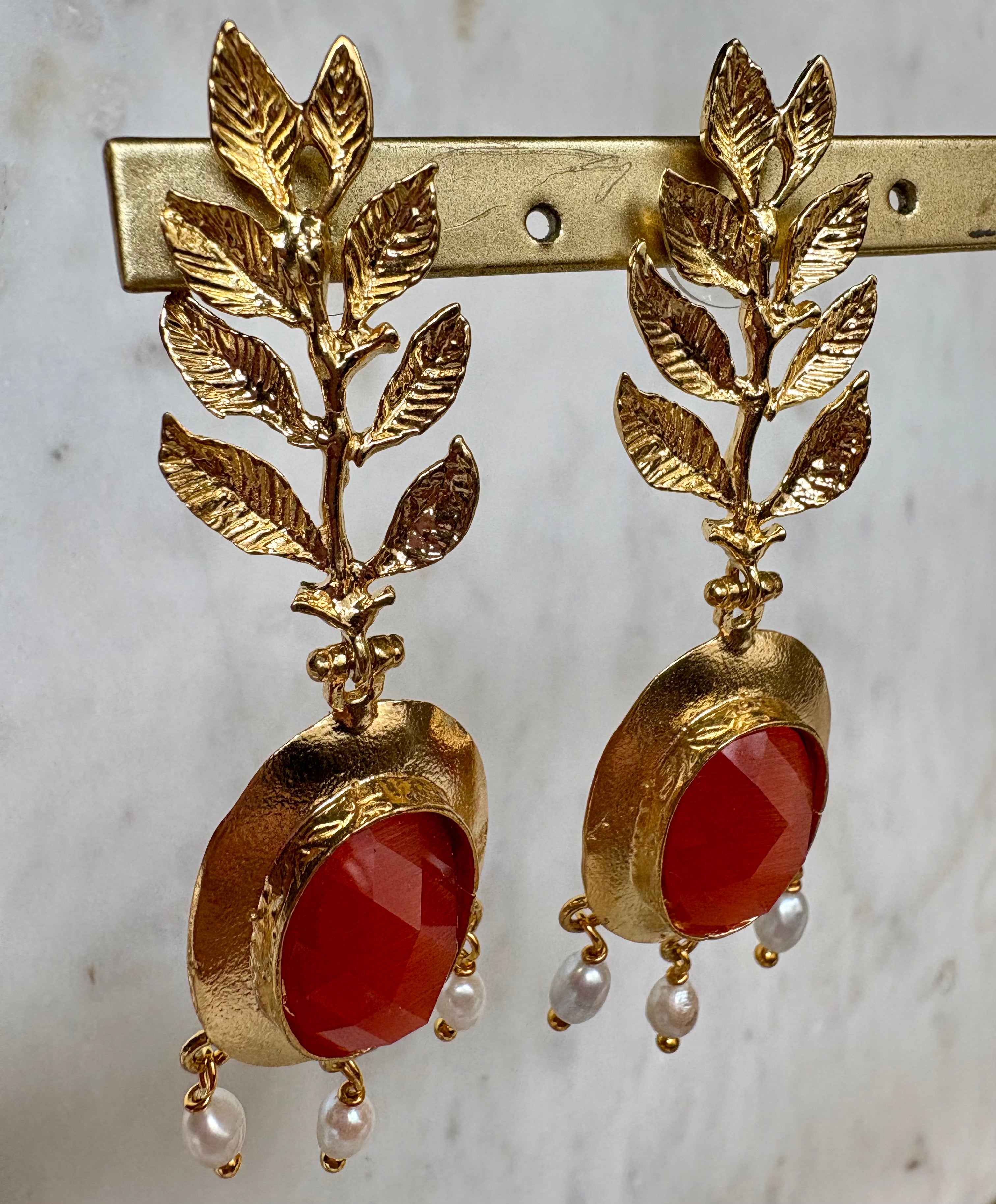 leaf design with orange gemstone earrings