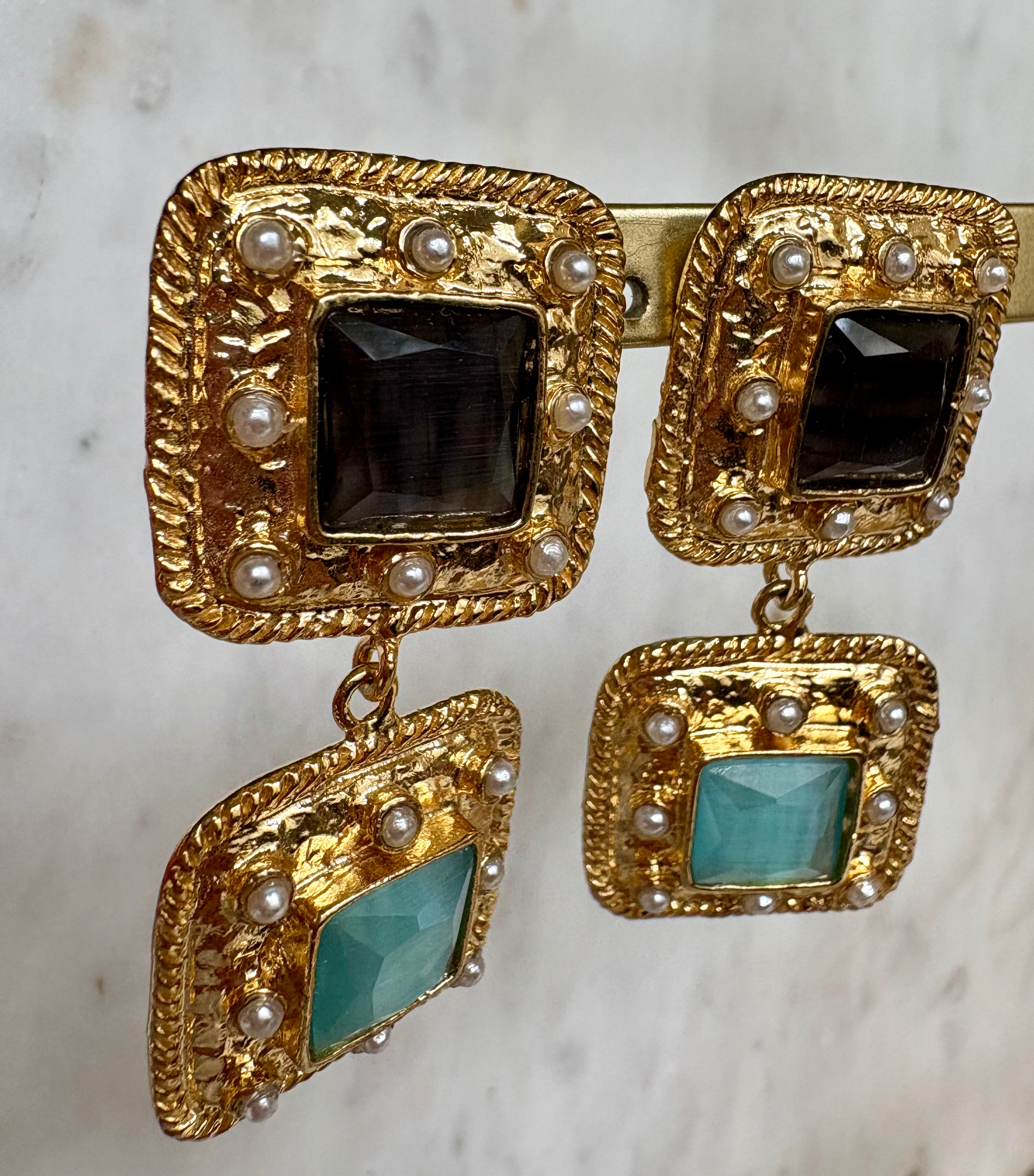black light blue gemstone statement earrings