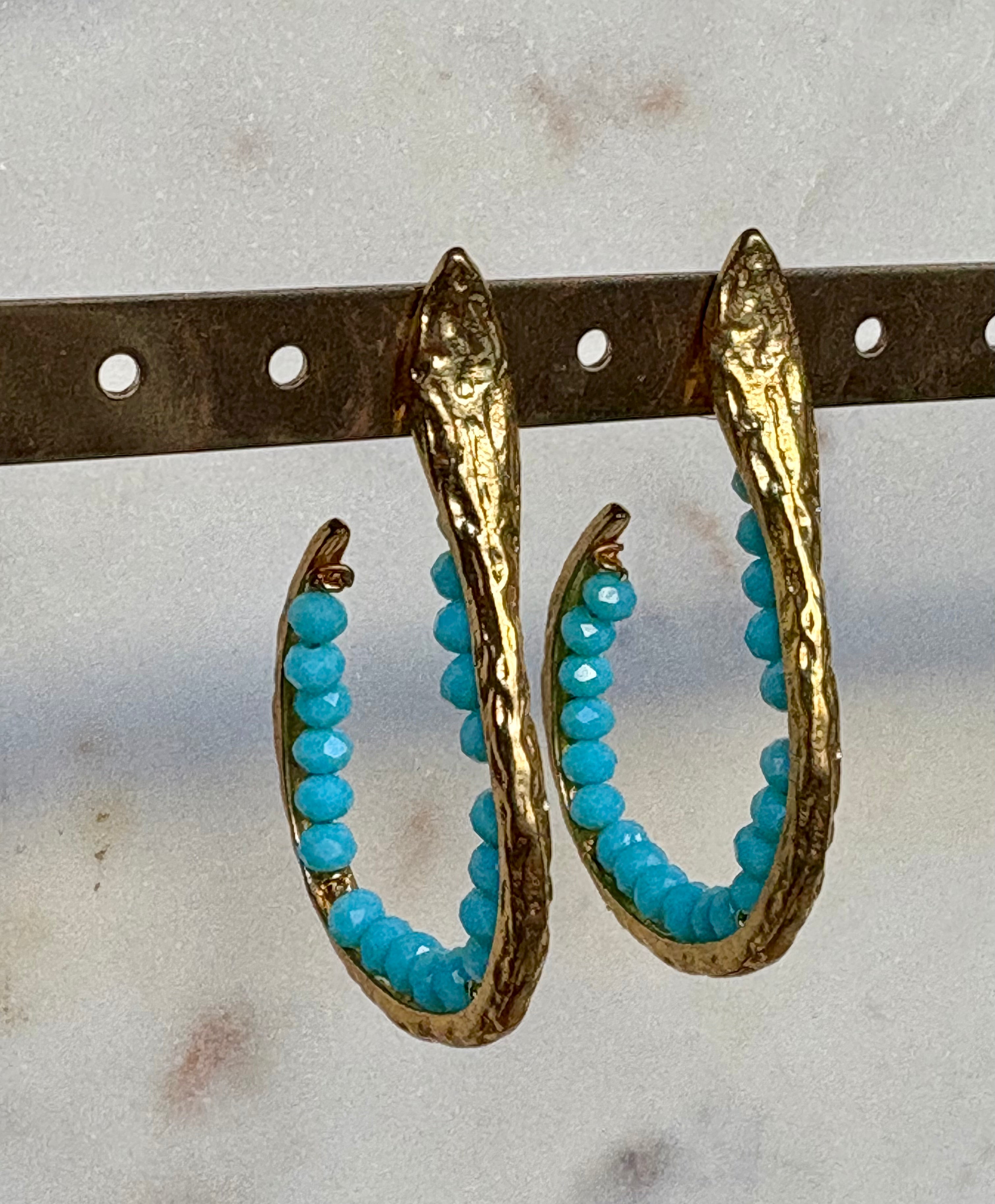 snake hoop earrings - sculptural design