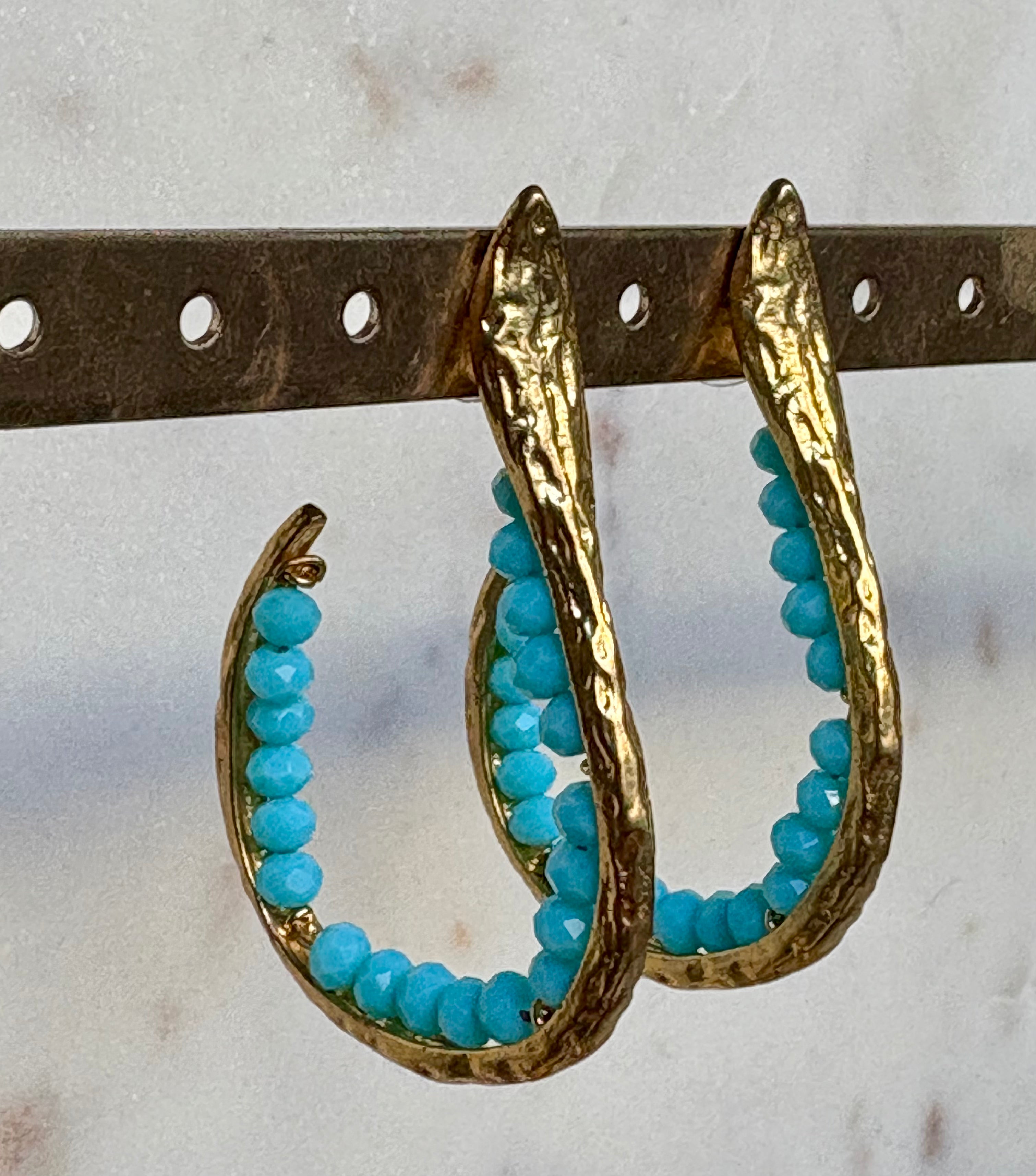 snake hoop earrings - sculptural design